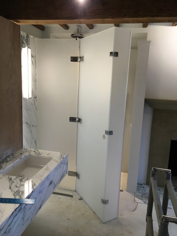 Bespoke frosted glass shower enclosure in Bushey luxury bathroom